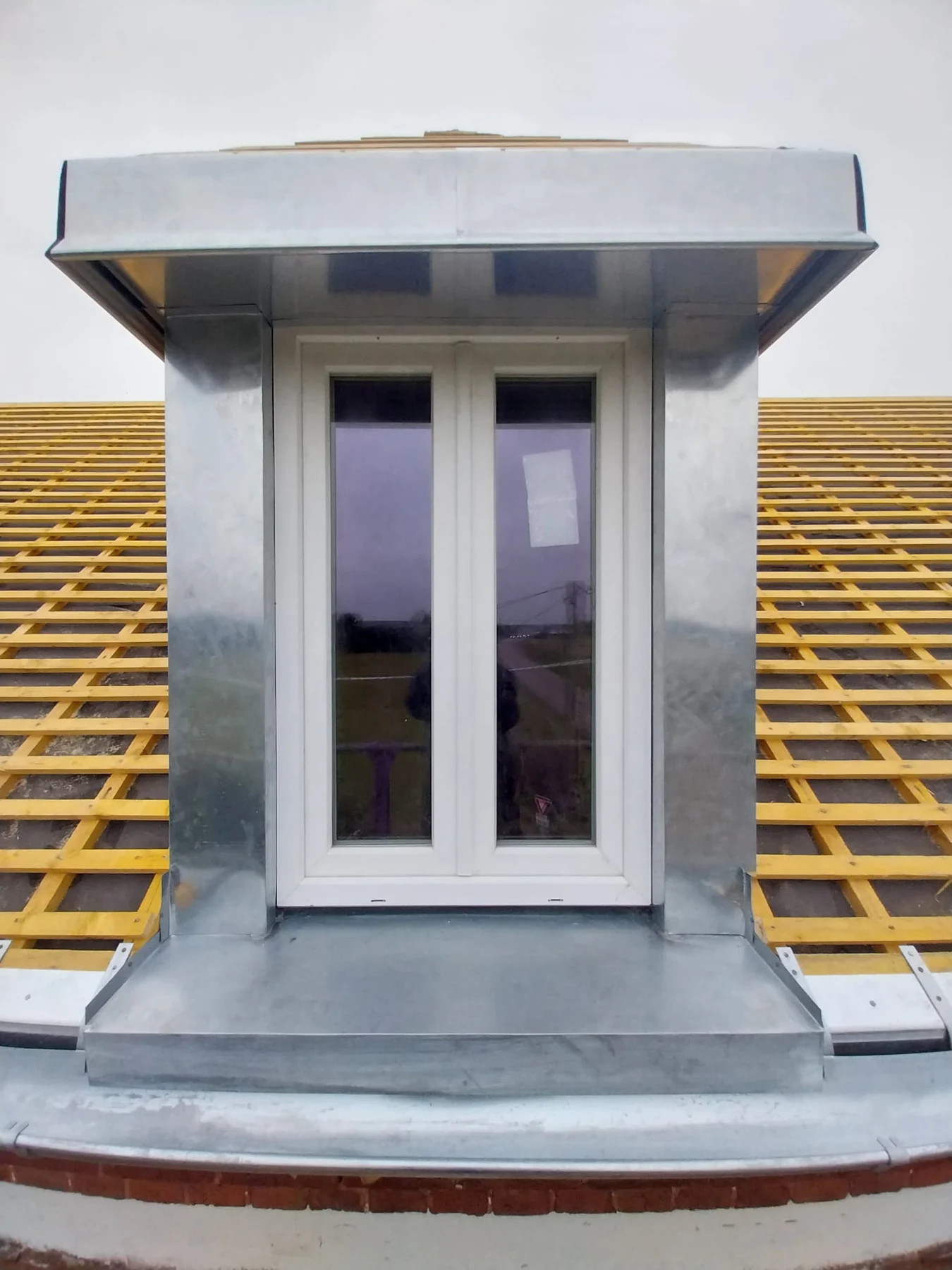 Création de la charpente d’une lucarne chien-assis habillée en zinc